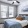 a bedroom with a fan and a bed